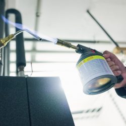 bauen Minol-Legionellenpruefung-Desinfizierung-der-Entnahmestelle